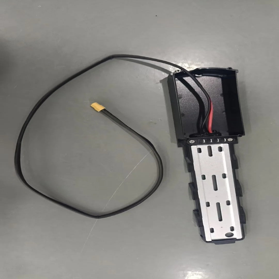 Electrical component with wires on a gray surface